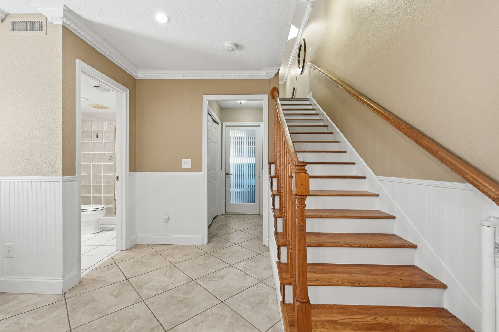 Stairs to 1st floor...Full Bath&  hall closet