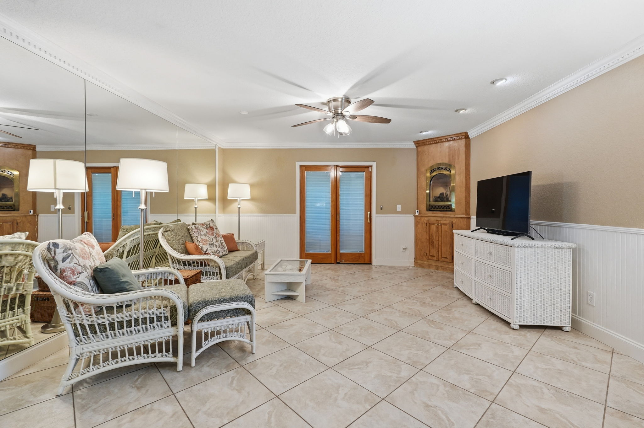 Doors Leading to Outdoor Screened Patio & Open Side Patio
