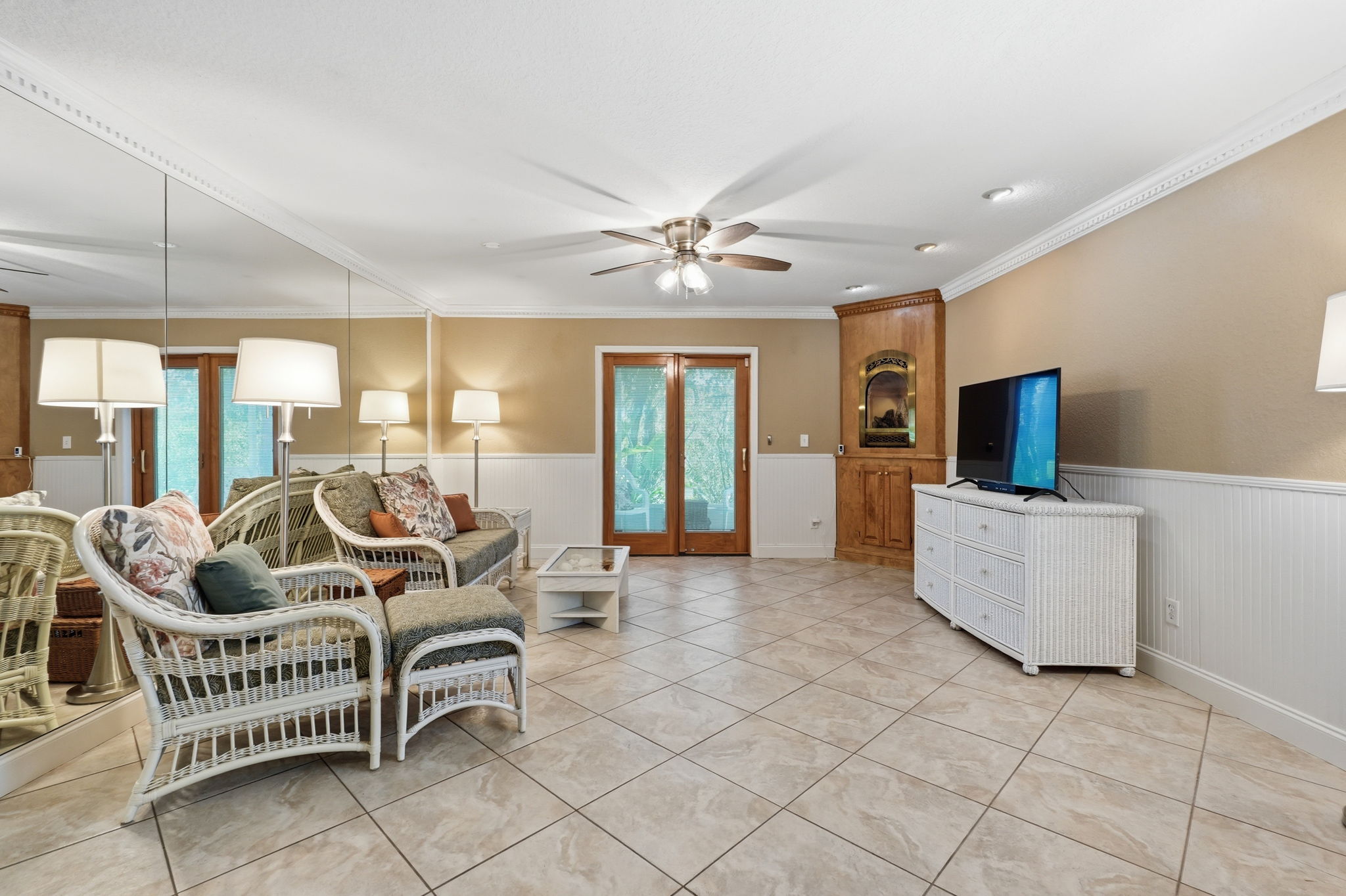 Doors Leading to Outdoor Screened Patio & Open Side Patio