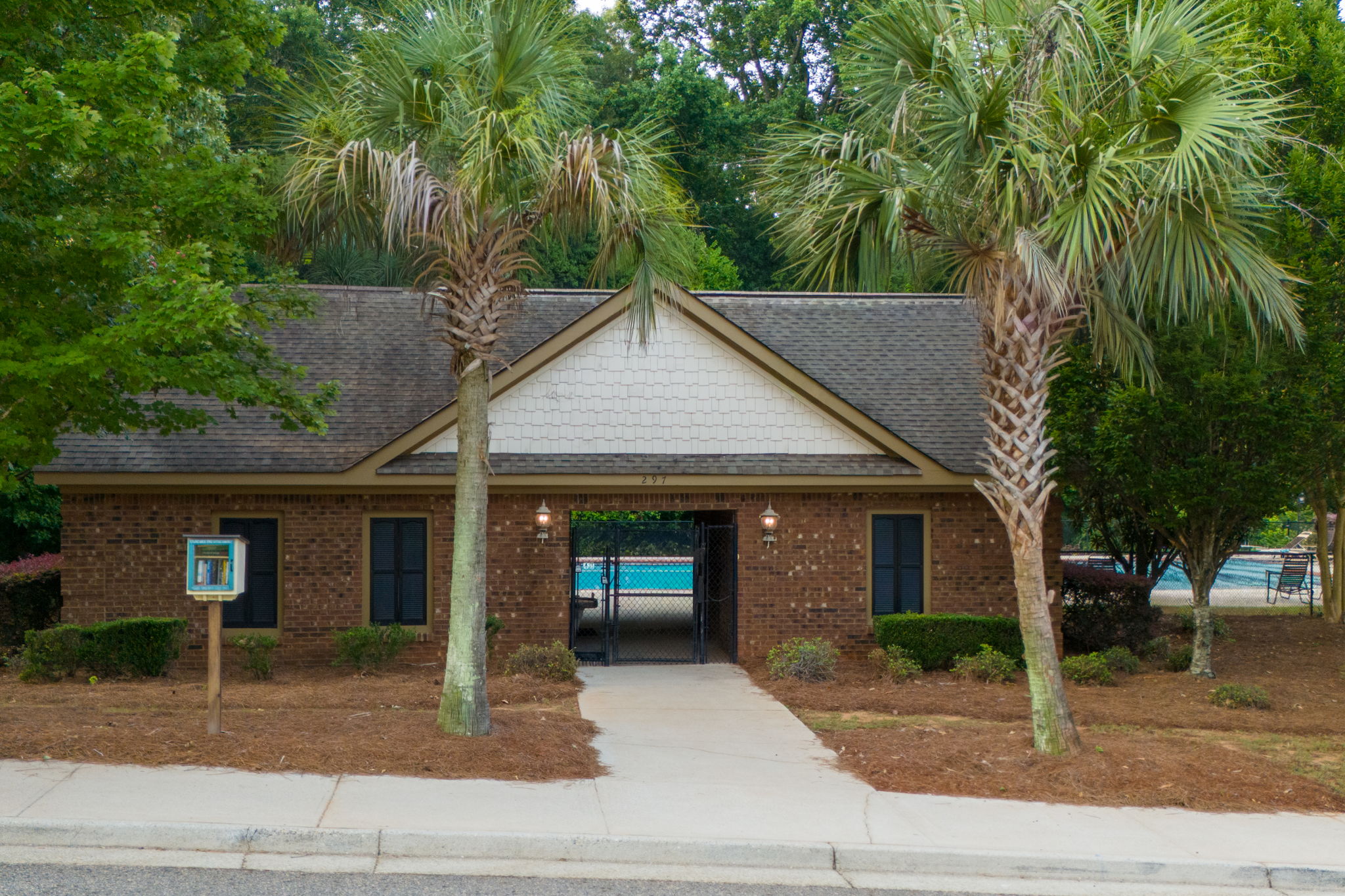 Neighborhood free library & pool house