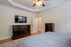 Primary suite with hardwood floors