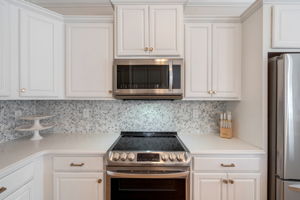 Kitchen w/ upgraded countertops & appliances