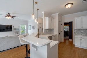 Kitchen peninsula with seating & pantry