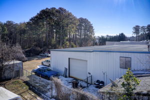 26 Aerial Exterior Side w Rear Lot Partial
