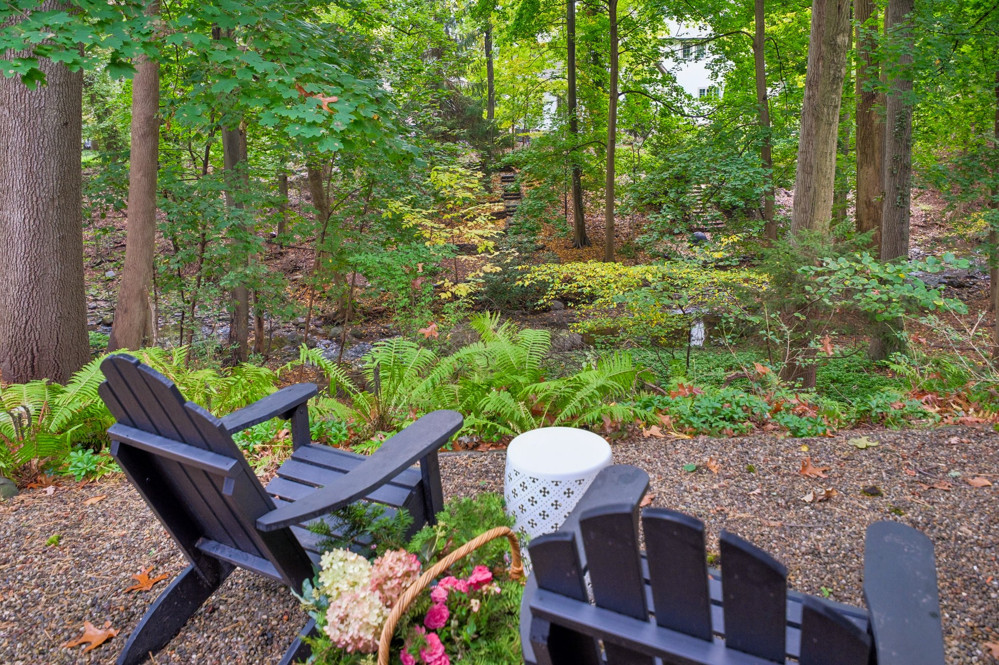 THIS IS YOUR BACKYARD. Imagine making a little time outdoors part of every day. Coffee among the ferns, a chapter beneath the trees, the brook providing the soundtrack. Right behind the house, a woodland retreat invites you to put down your phone and stay awhile. A little Catskills. A lot to come home to.
