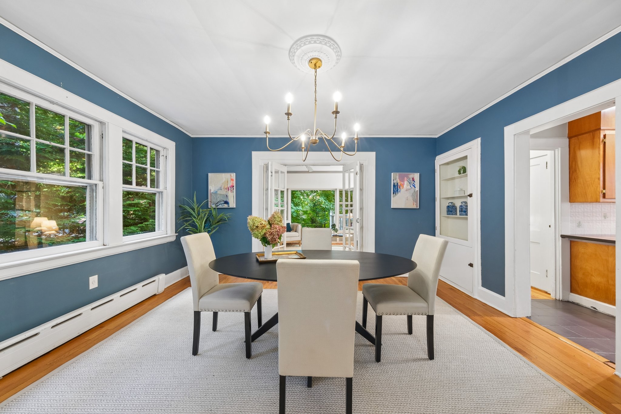 FROM KITCHEN TO TABLE. The dining room sits conveniently beside the kitchen, ready for everything from a quick supper to the dinner you have been meaning to host.