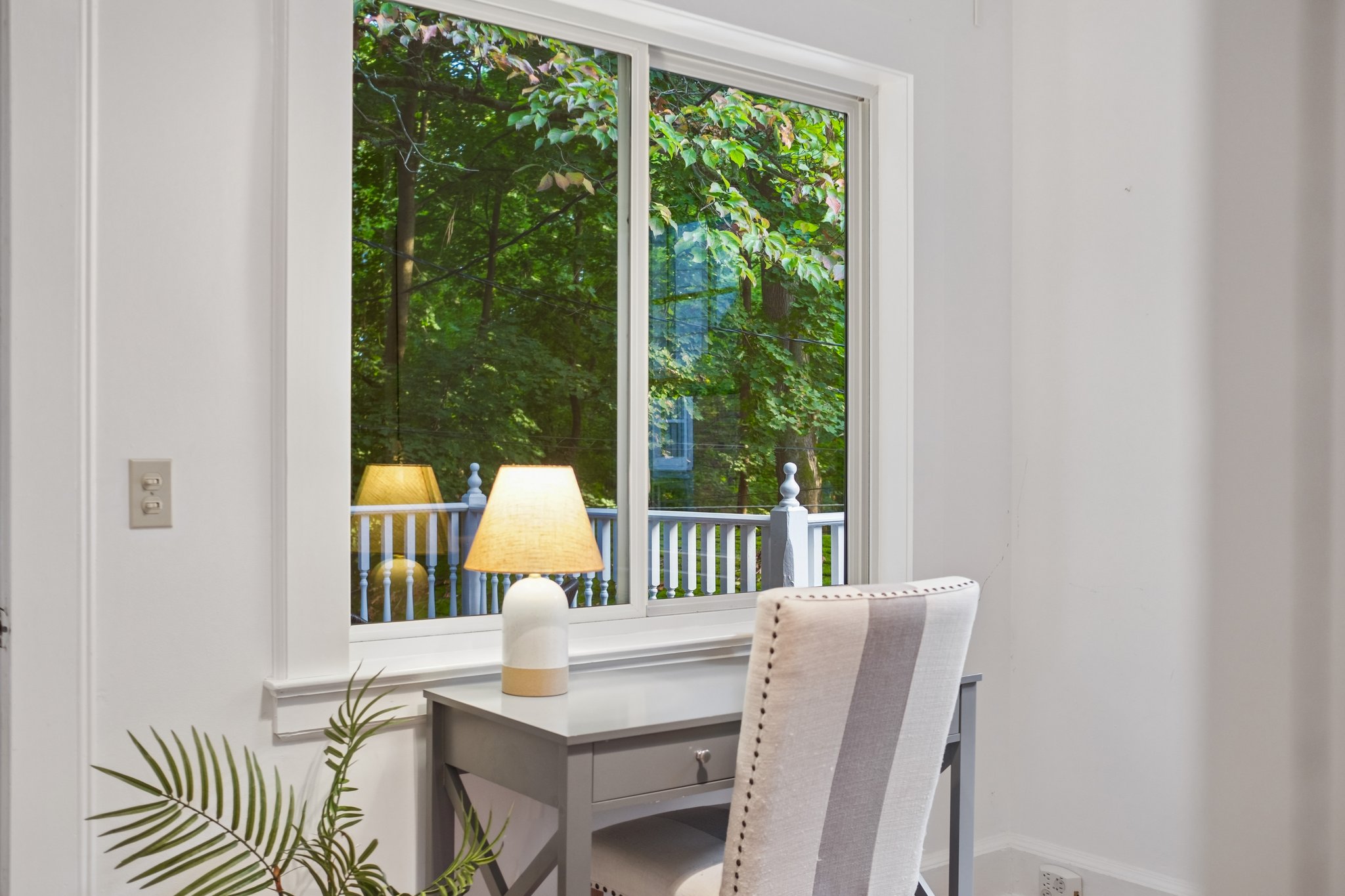 GIVE YOUR WORKDAY A BETTER OUTLOOK. Trade the blank wall for a window into the trees. Your desk deserves a view, too.