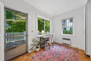 A COMMUTE MEASURED IN STEPS. This separate office has leafy views and its own exterior entrance beside the deck. A place to focus, then step outside between calls. Or will you make it a bedroom?