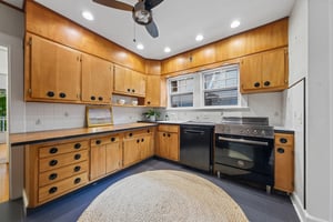 FOR THE COOK WHO LIKES TO IMPROVISE. A substantial range, generous cabinetry and a kitchen with character. Follow a recipe or see where the evening takes you.