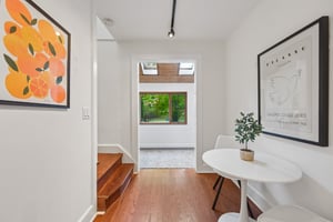 A SPOT FOR YOUR OWN ROUTINE. A small table for writing, a landing place for the day's essentials or a perch for planning what comes next. Useful little spaces make a house personal.