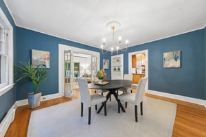 MAKE DINNER AN OCCASION. Rich blue walls set the scene for candlelight, a favorite recipe and the people who always stay for one more story.