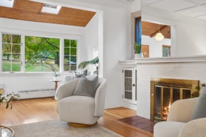 YOUR FAVORITE CORNER, FOUND. A comfortable chair, a good book and the fireplace close by. Some of the best plans involve staying home.