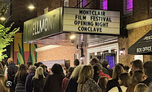 HOUSE HUNTING, WITH A PLOT TWIST. The 2026 Montclair Film Festival runs October 16–25. Book a screening while you're here and make a day of discovering the town. Archival festival photograph from 2024.