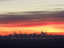 CITY PLANS? YOU’RE CONNECTED. Manhattan is just 13 miles away, with train and bus options nearby. Routes 3 and 46 and the Garden State Parkway make trips beyond town easy. Regional skyline photograph; not a view from the property.