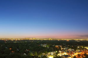 THE BALANCE YOU CAME FOR. Upper Montclair's evening glow, the city's lights beyond and your own quieter corner to return to. Neighborhood aerial; not a view from the property.