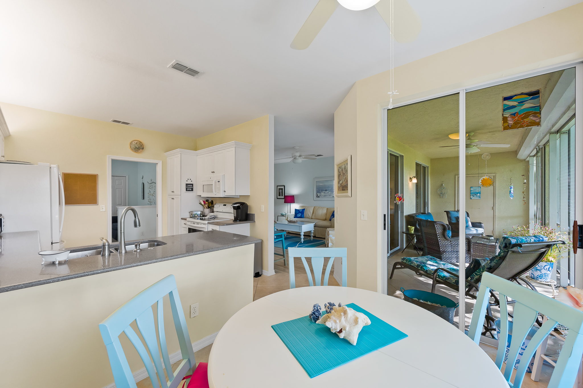 Dine-in kitchen with lanai access.