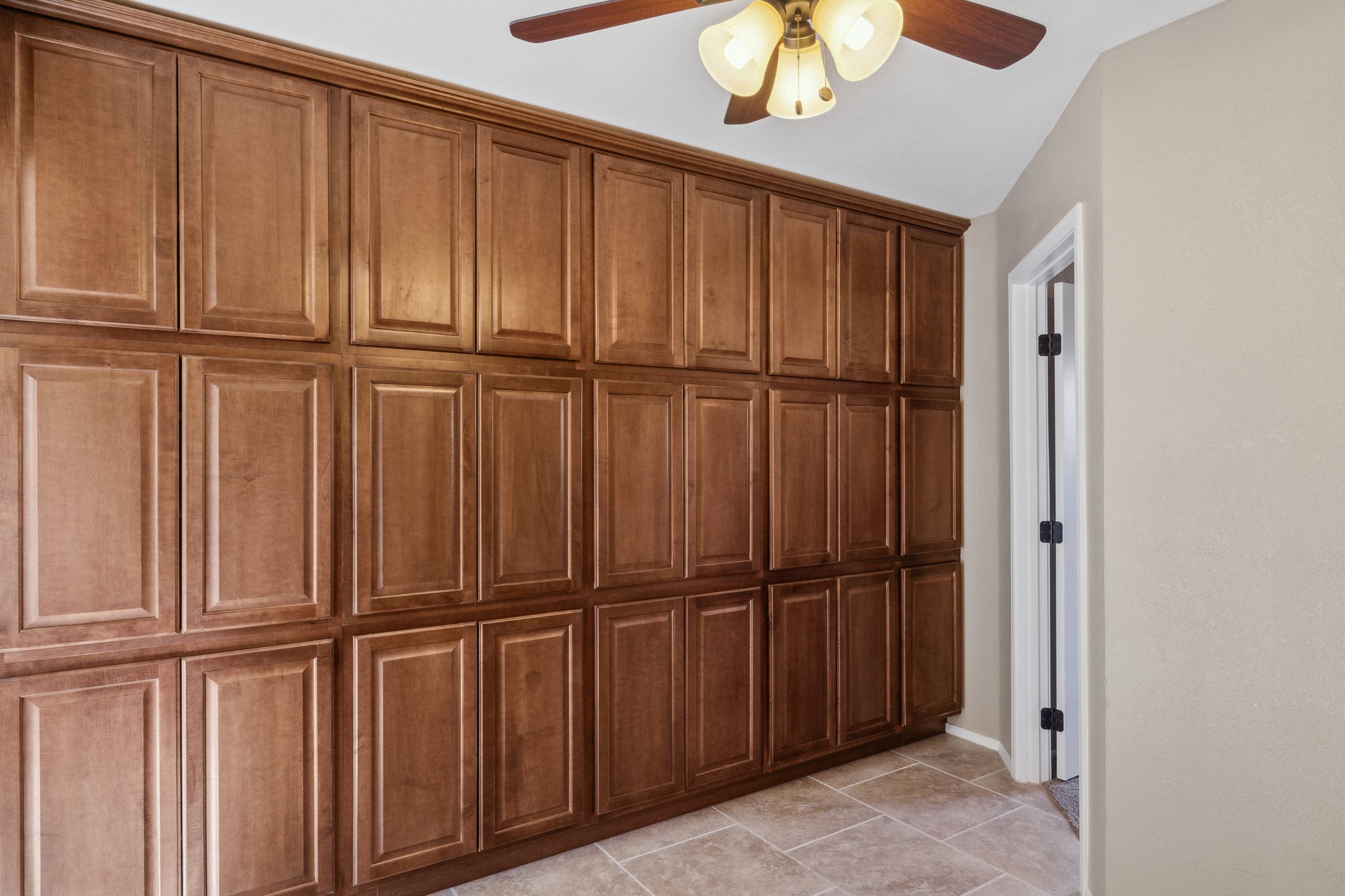 15077 W Vale Dr - 018 Den with Custom Storage.jpg