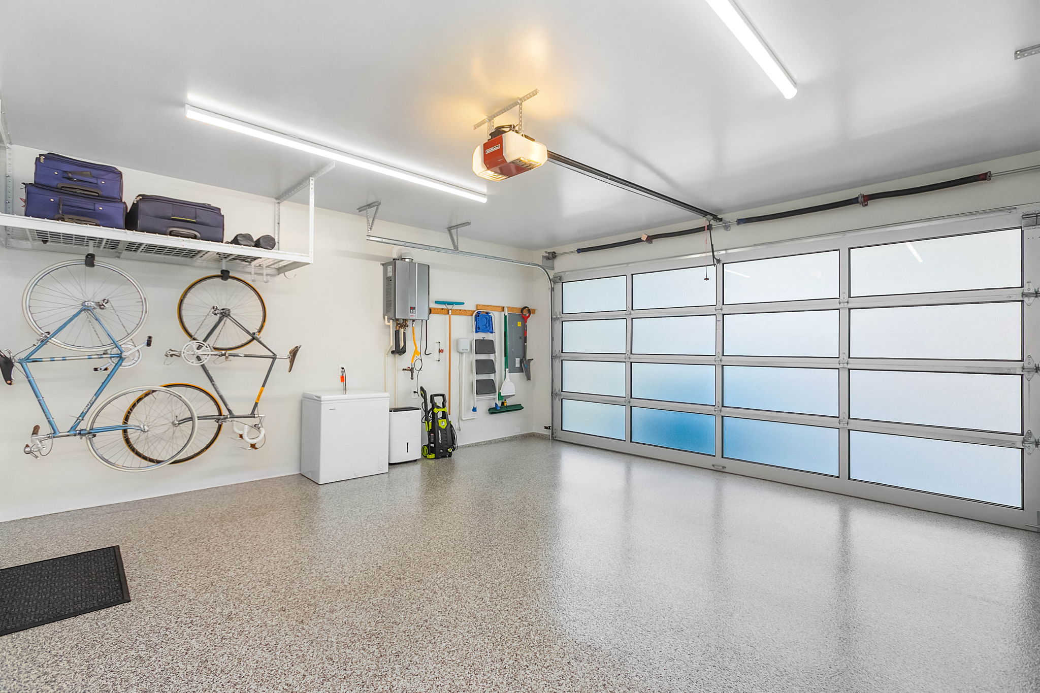 Stunning garage, insulated and poly-aspartic flooring.