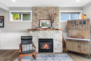 Custom upgrades fireplace with stone and live edge mantel