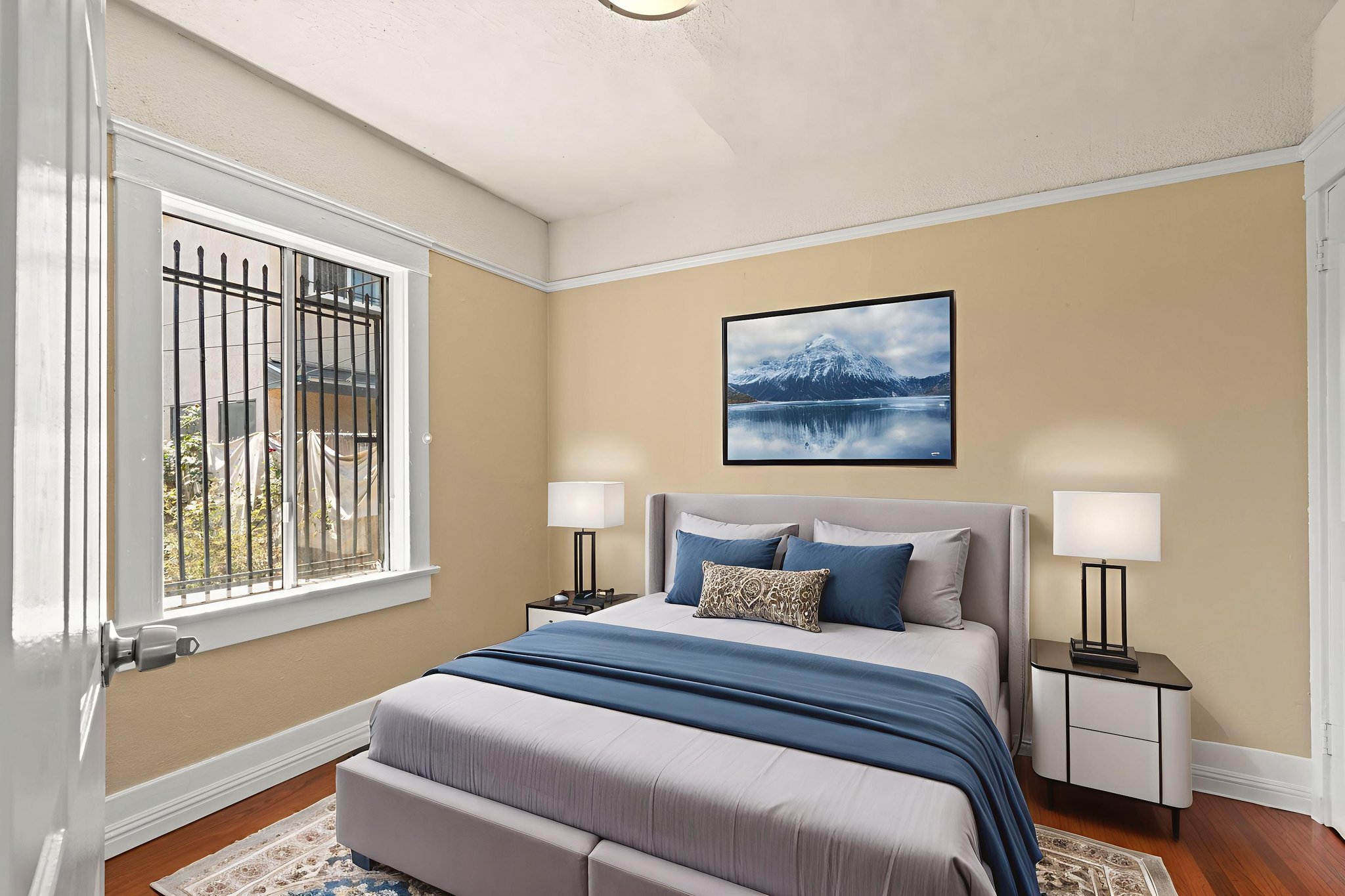 Back Unit-Bedroom 1 virtually staged.jpeg