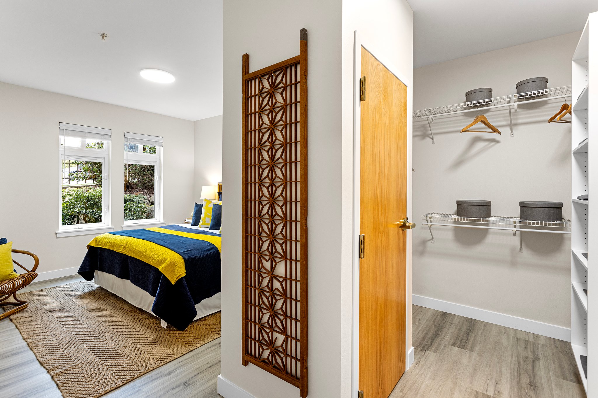 The primary suite is a haven of space and style, with a walk-in closet that offers generous room for wardrobe essentials, and an extra closet for additional storage needs.