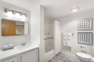 A well-appointed full bathroom completes this master retreat, providing comfort, convenience, and a touch of luxury.