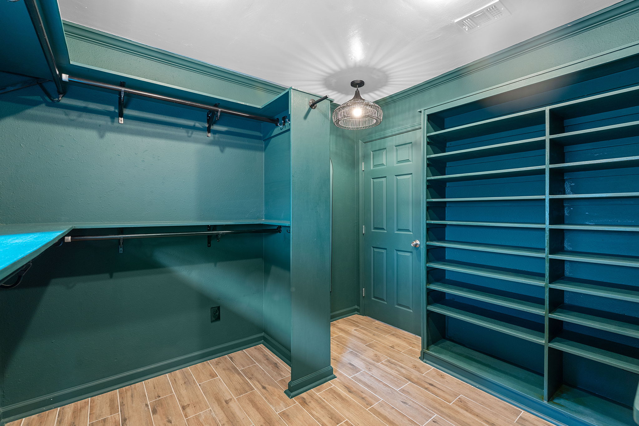 Fourth bedroom has been converted to a bespoke dressing room.