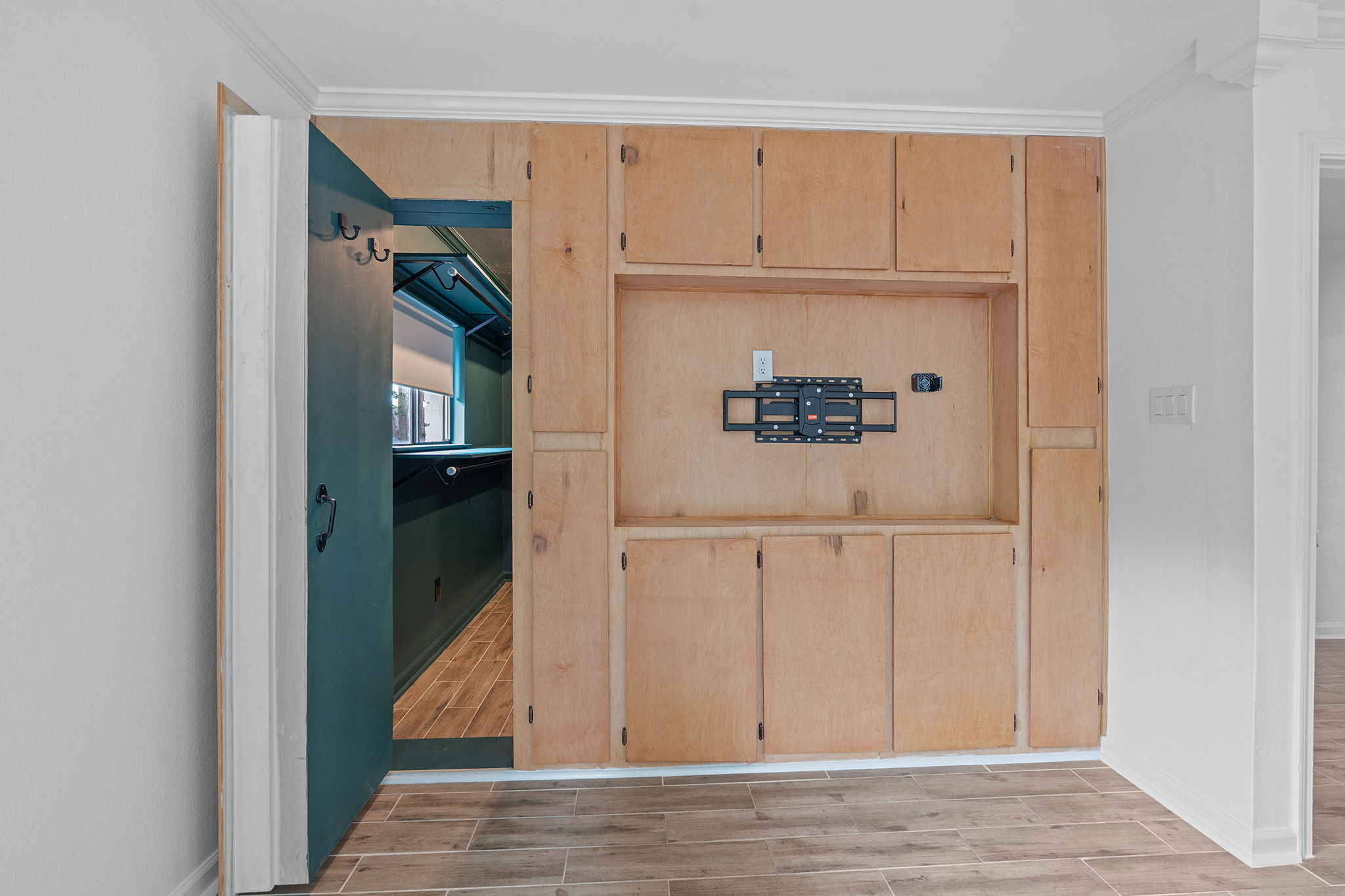 Primary bedroom's secret passage to the dressing room