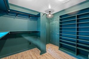 Fourth bedroom has been converted to a bespoke dressing room.