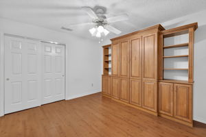 En-Suite Second Bedroom with Custom Murphy Bed and Cabinetry