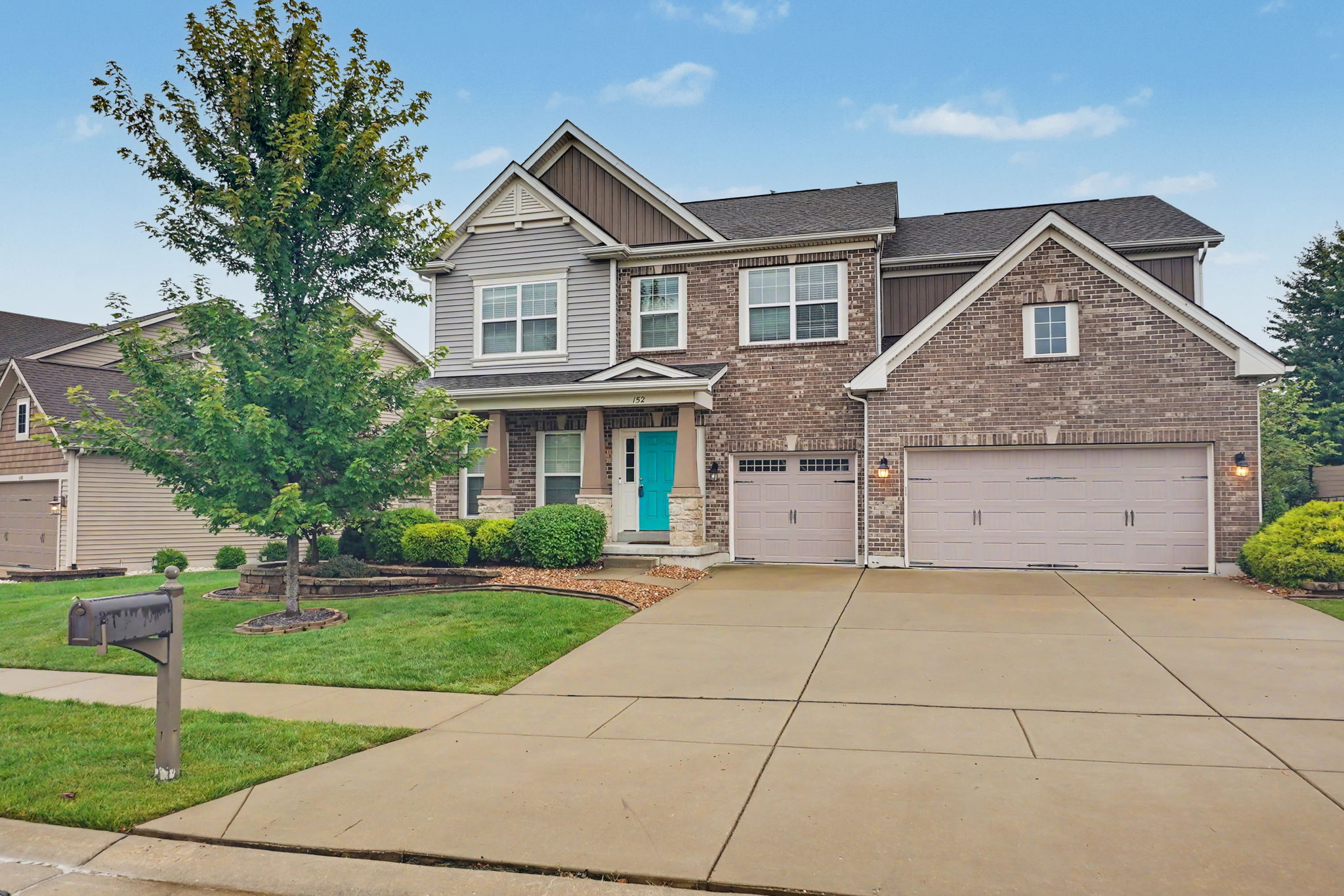 Property features a level yard, lawn irrigation system, and 3-car garage.