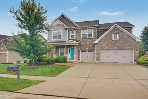 Property features a level yard, lawn irrigation system, and 3-car garage.