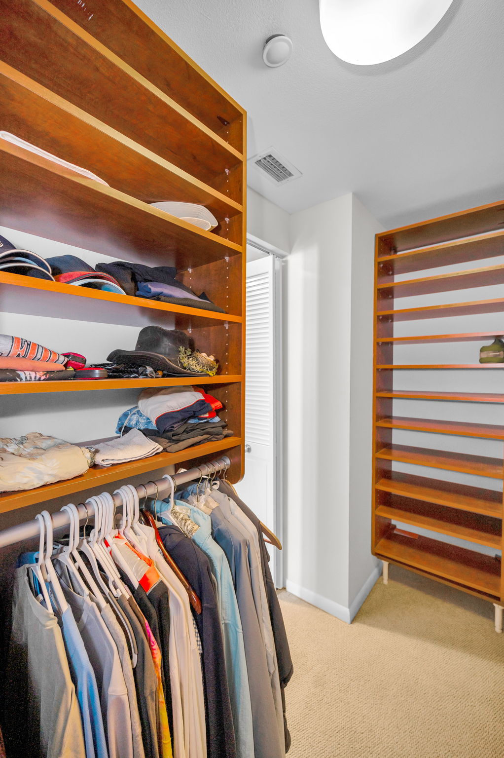 Primary Bedroom Walk-in Closet1b