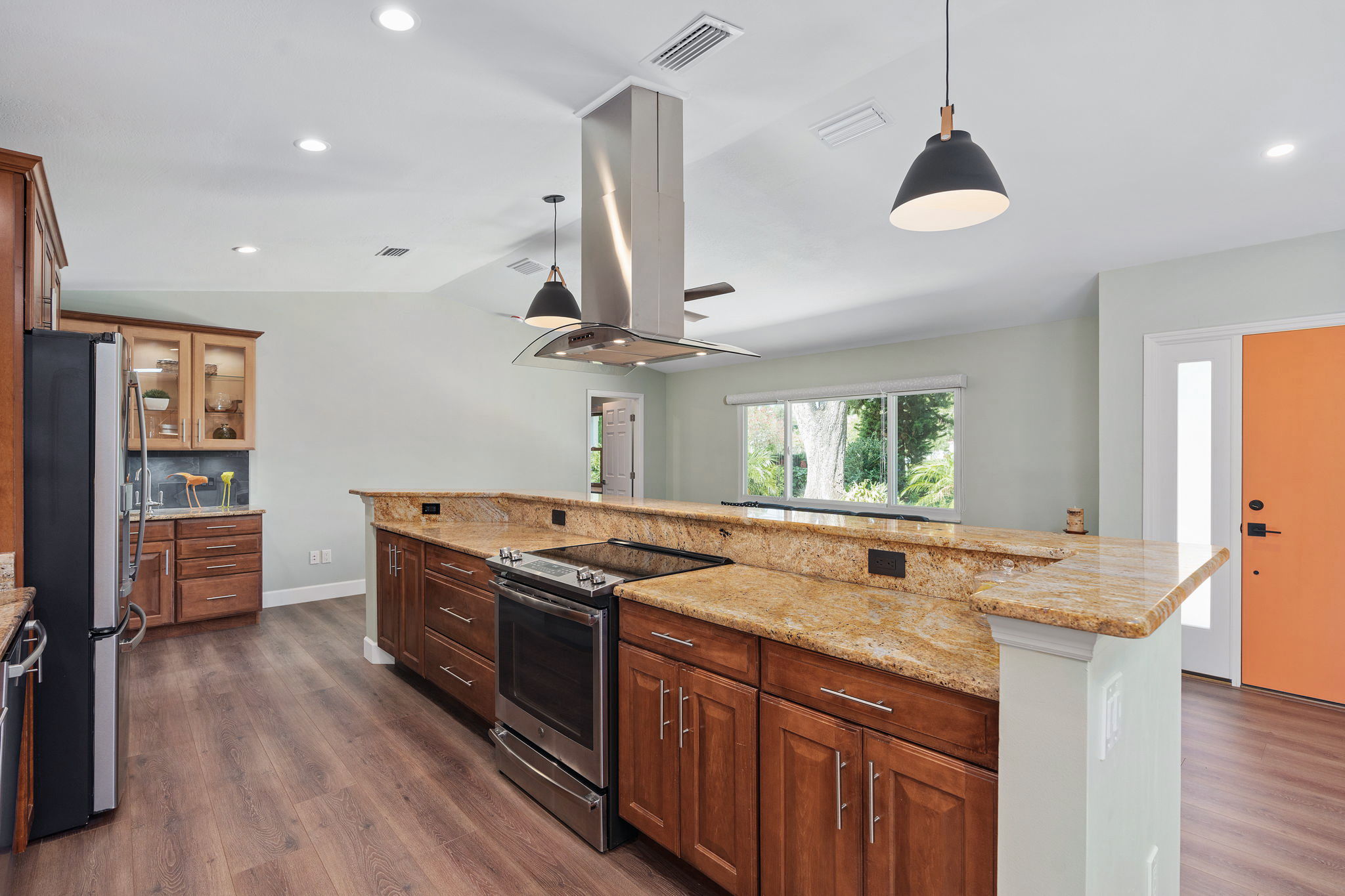 Expansive breakfast bar and cooking island