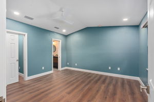 Owners suite with vaulted ceilings & recessed lighting