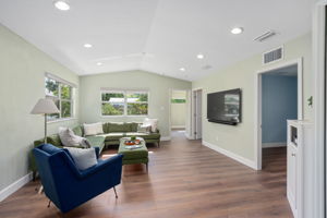 Family Room with vaulted ceilings & recessed lighting