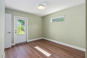 Bedroom 4 with separate entrance and access to backyard