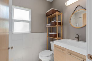 Guest house bath with floating vanity