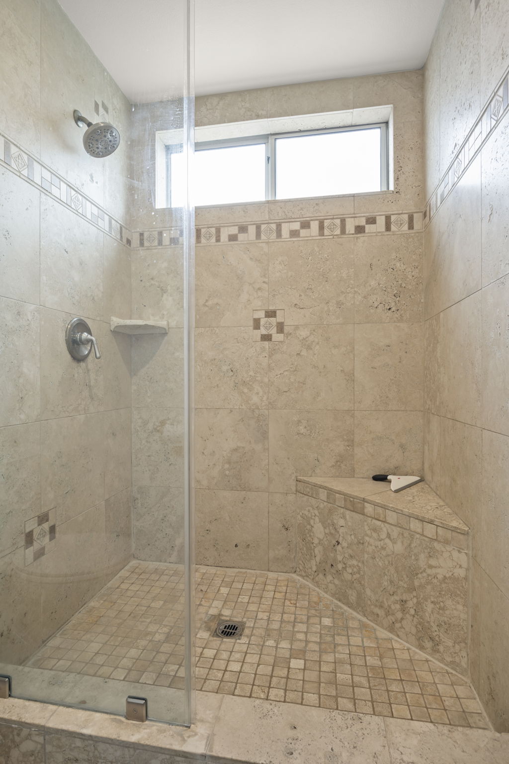 Custom tile you won’t want to cover with a curtain.