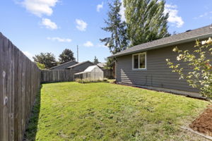 fully-fenced side and backyard
