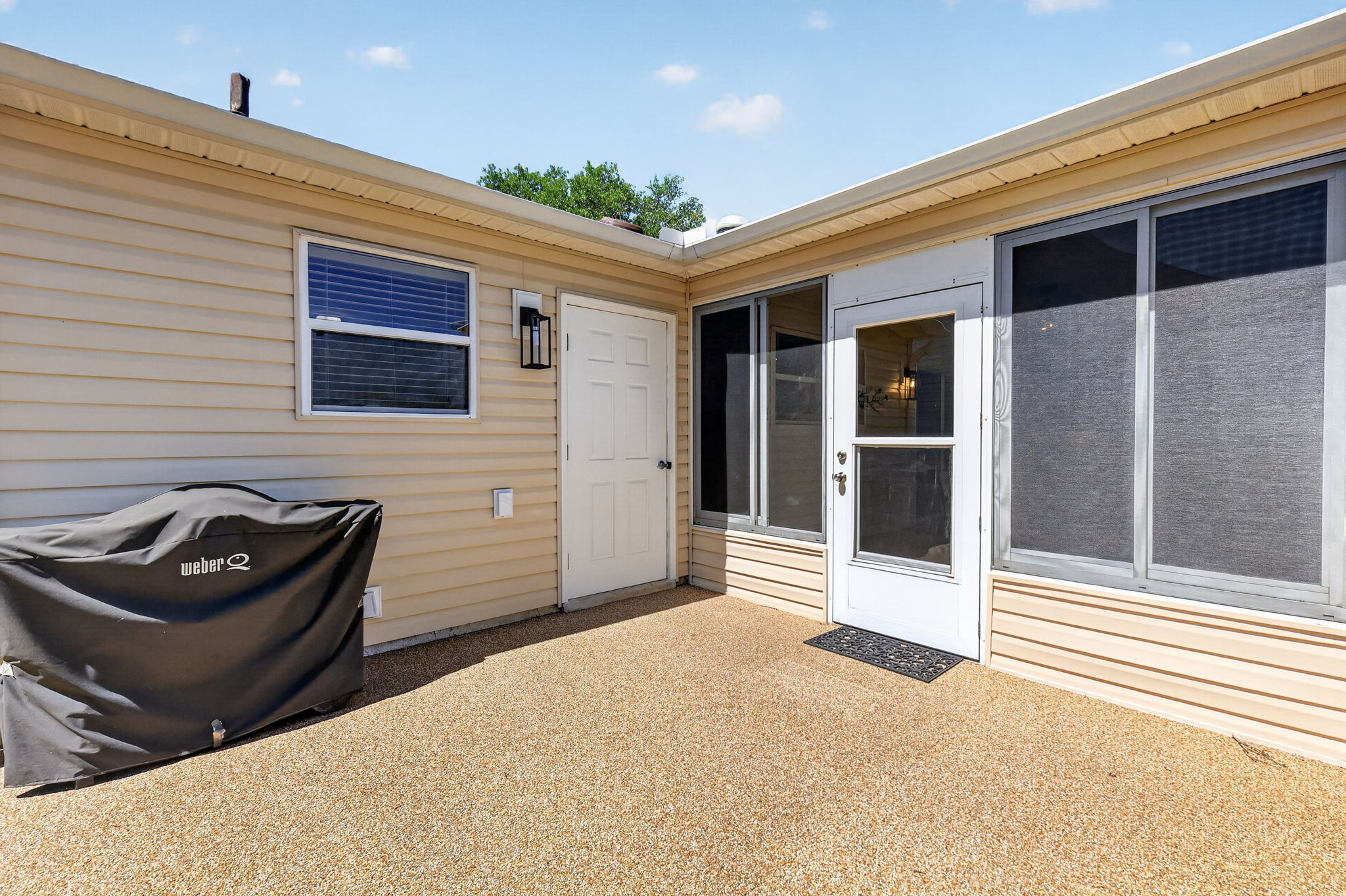 Rear Epoxy Pebble Patio