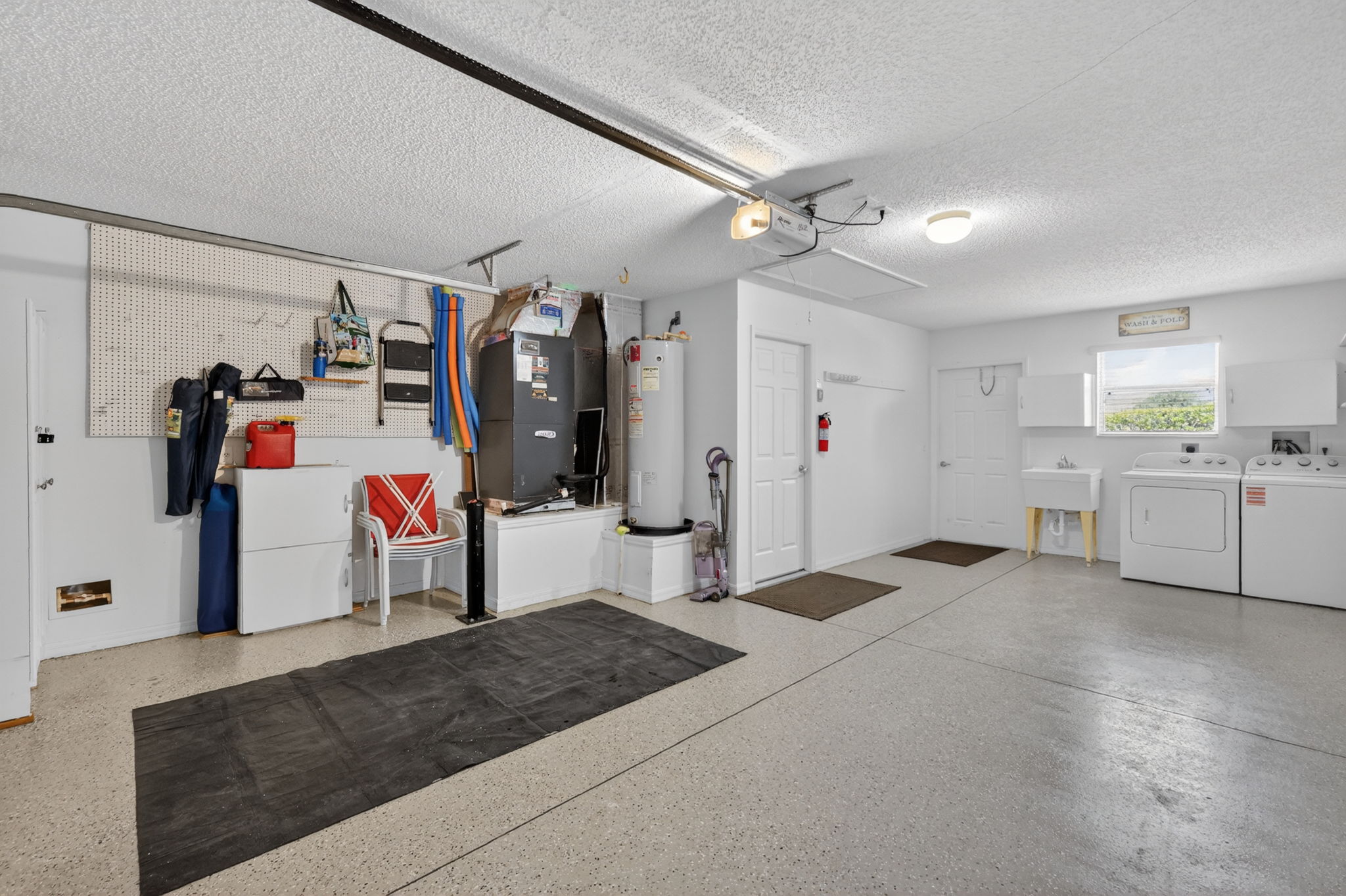 Garage with Epoxied Floor and Laundry