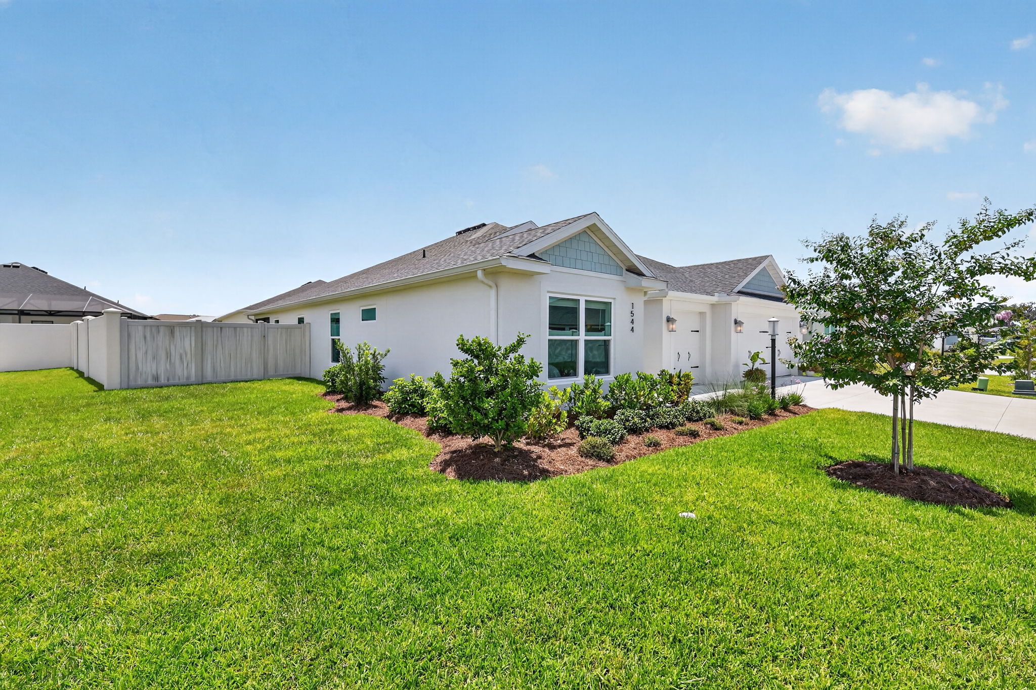 Front and Side Elevation with SPACIOUS CORNER LOT!