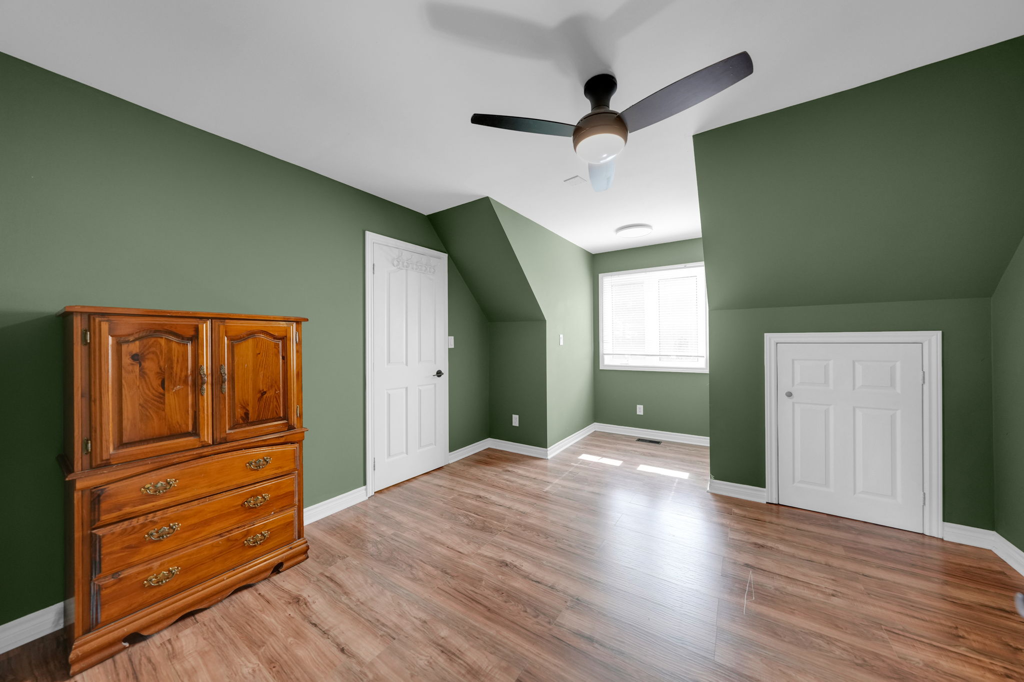 upper level apt bedroom with walk in closet