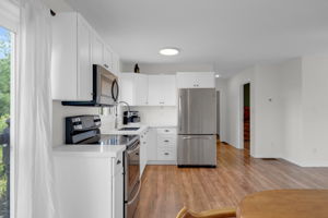 apt upper level kitchen and hall to bedroom