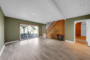 main lower level office/family with walk out to patio