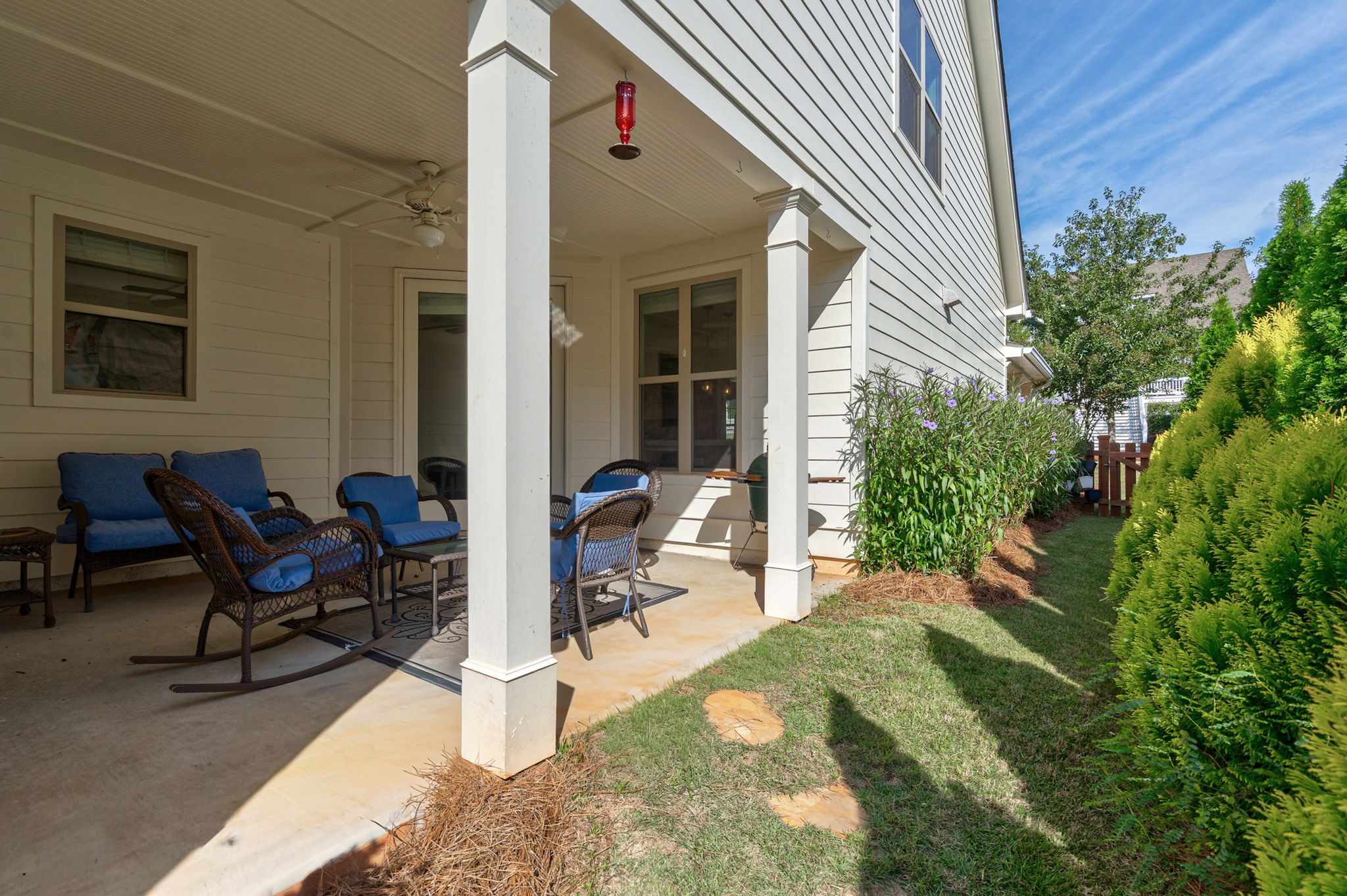 Side porch with yard access (fenced)