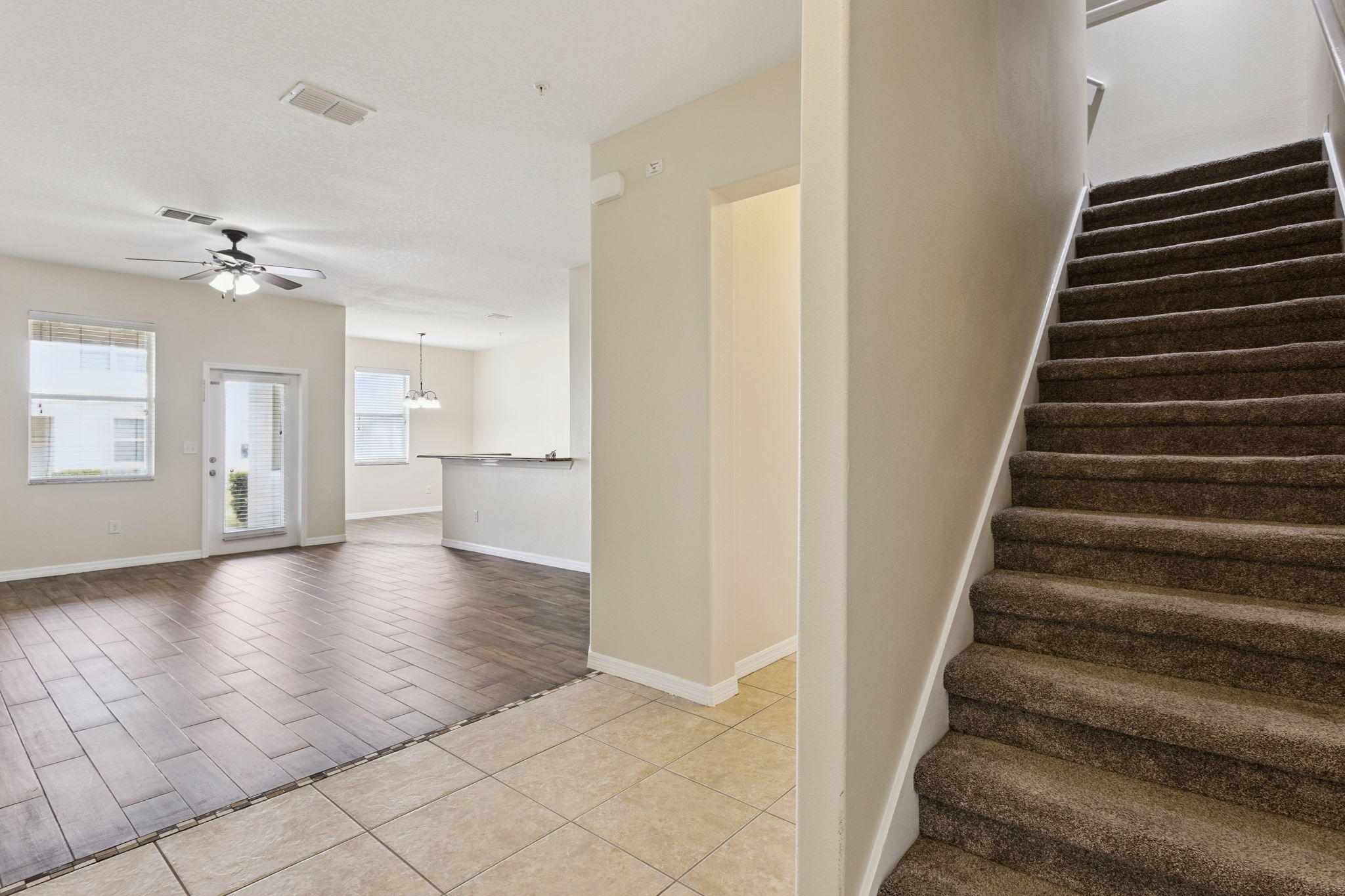stairs leading to loft, bedrooms and laundry room