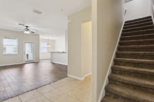 stairs leading to loft, bedrooms and laundry room