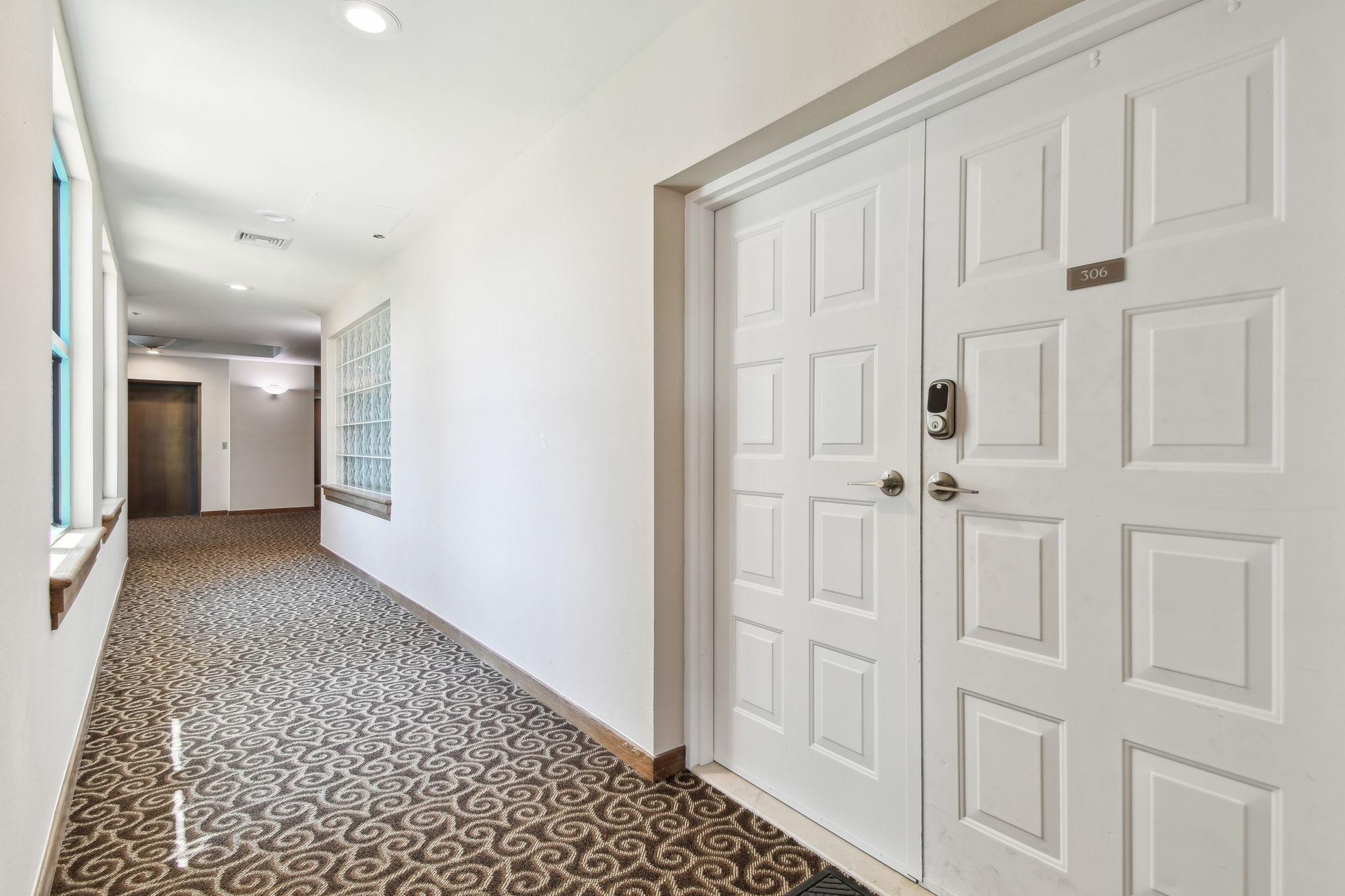 Front Door Entrance and Hallway off Elevator